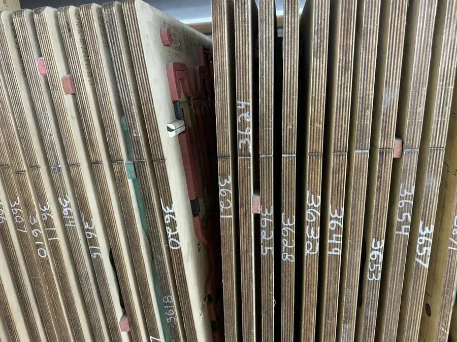 die boards arranged in a library for folding cartons