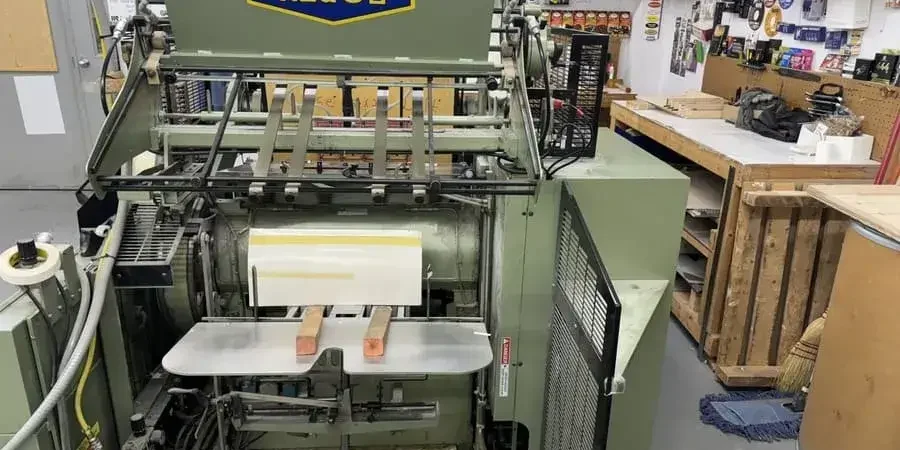Kluge Die cutter and Foil Stamper in a shop setting