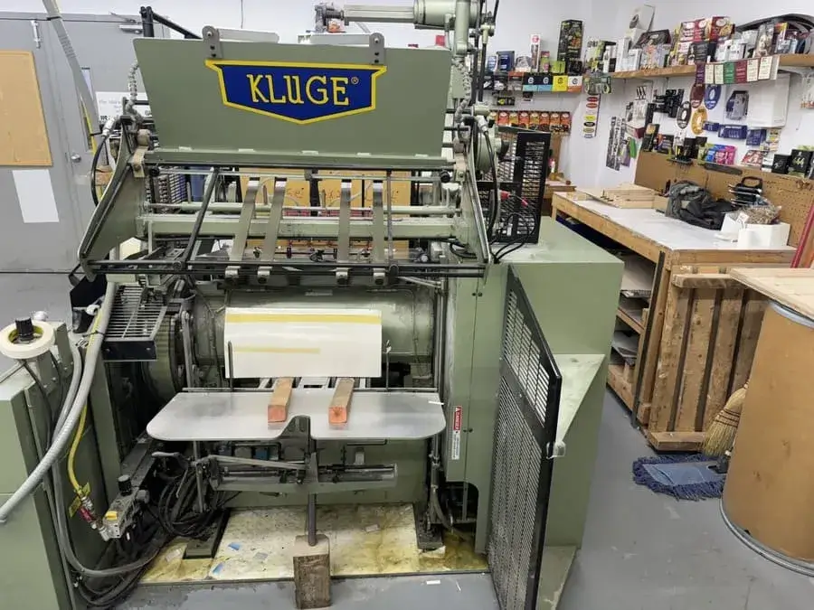 Kluge Die cutter and Foil Stamper in a shop setting